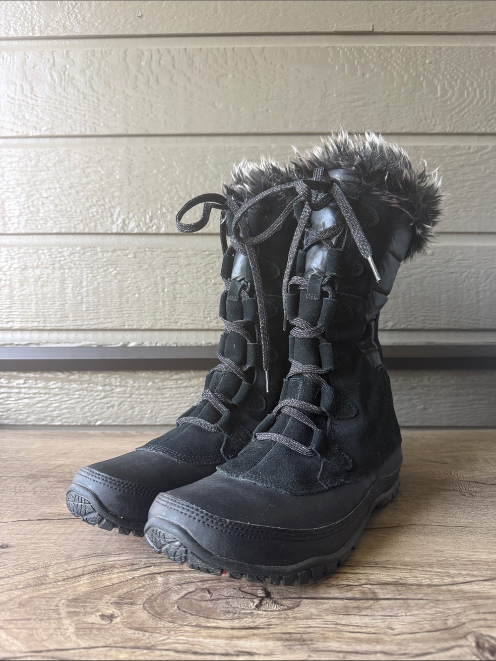 The North Face Women’s Waterproof Nuptse purna boot size 10